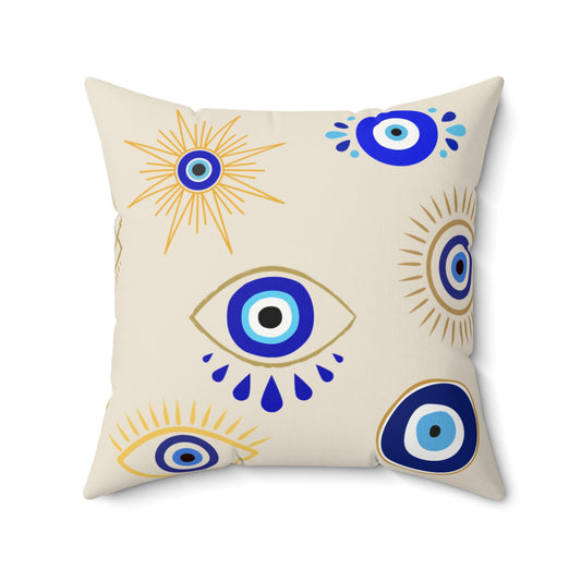 Decorative pillow with evil eye pattern on a beige background