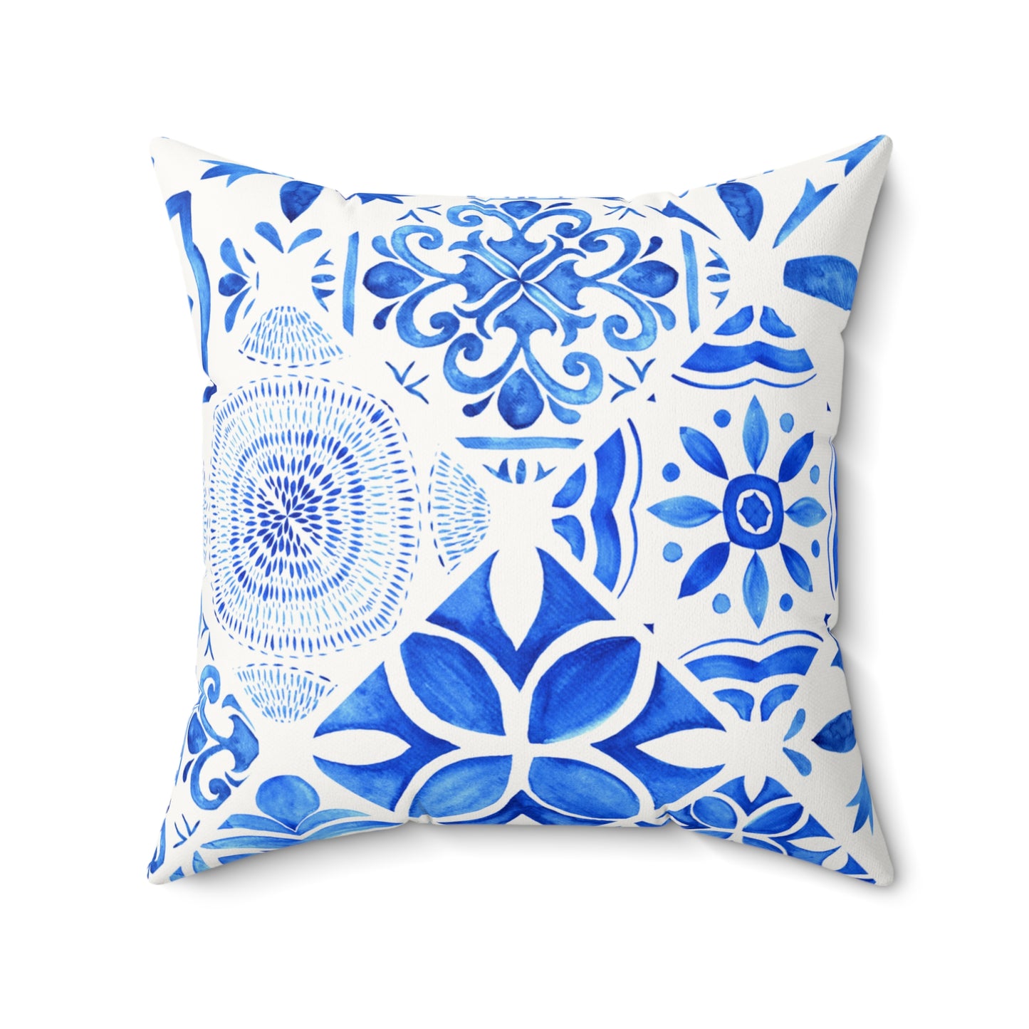 Decorative pillow with blue and white geometric pattern on a white background