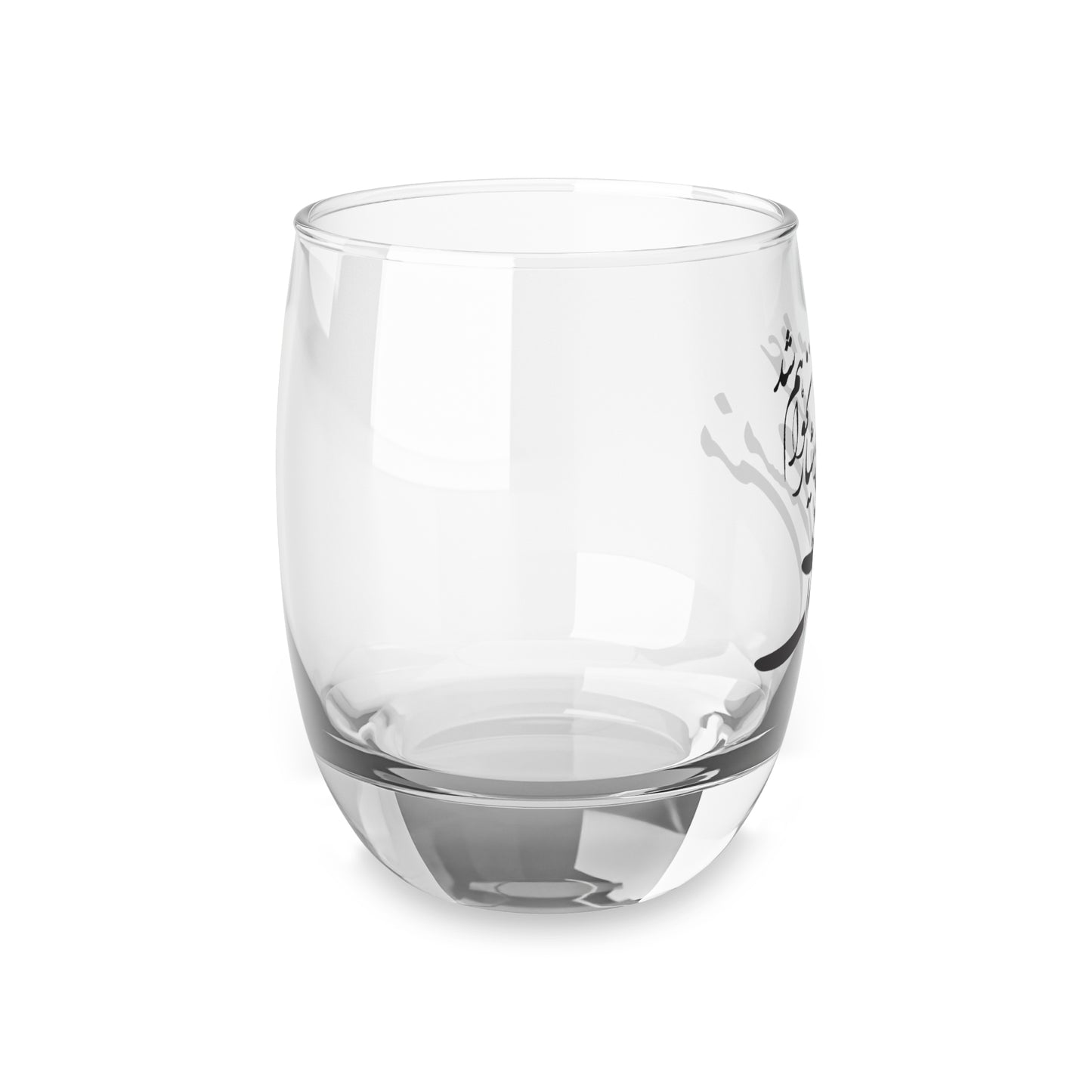 Clear glass tumbler with black text on a white background