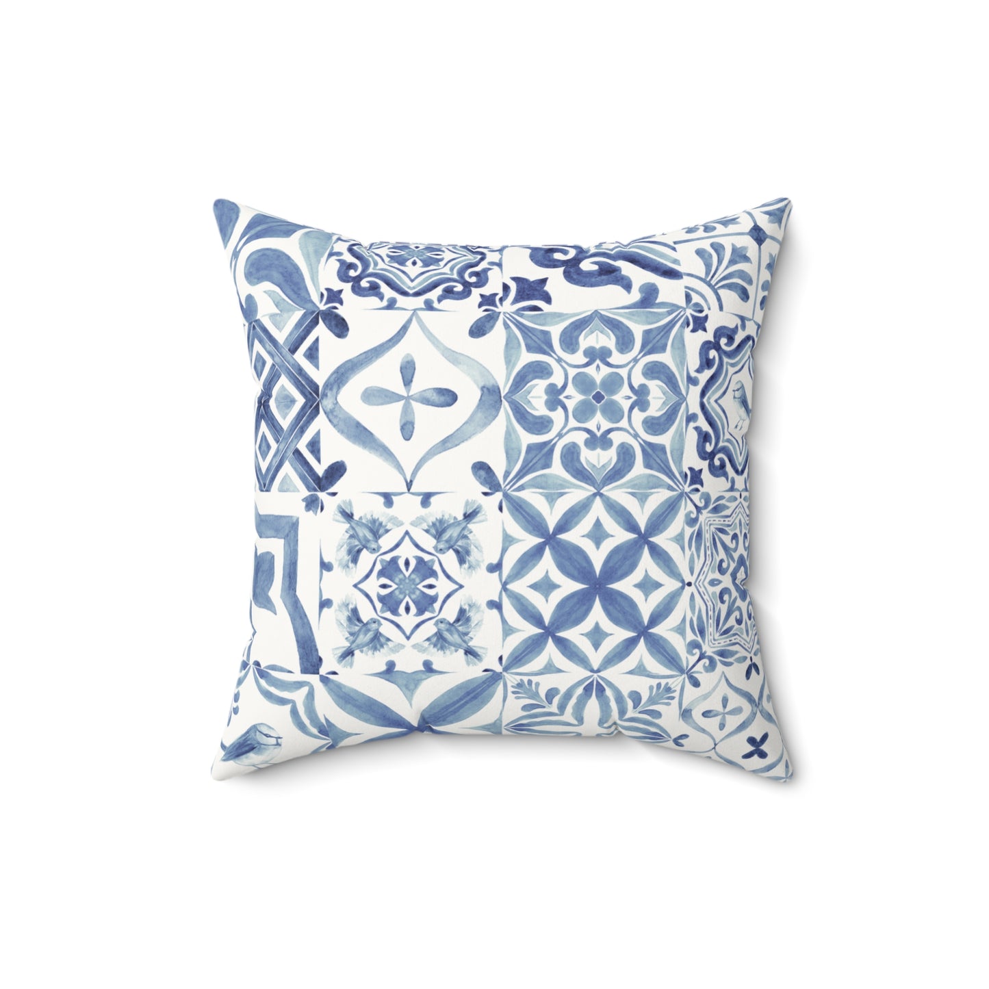 Decorative pillow with blue and white geometric pattern on a white background