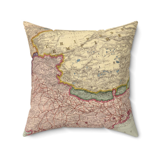 Map-themed decorative pillow on a white background