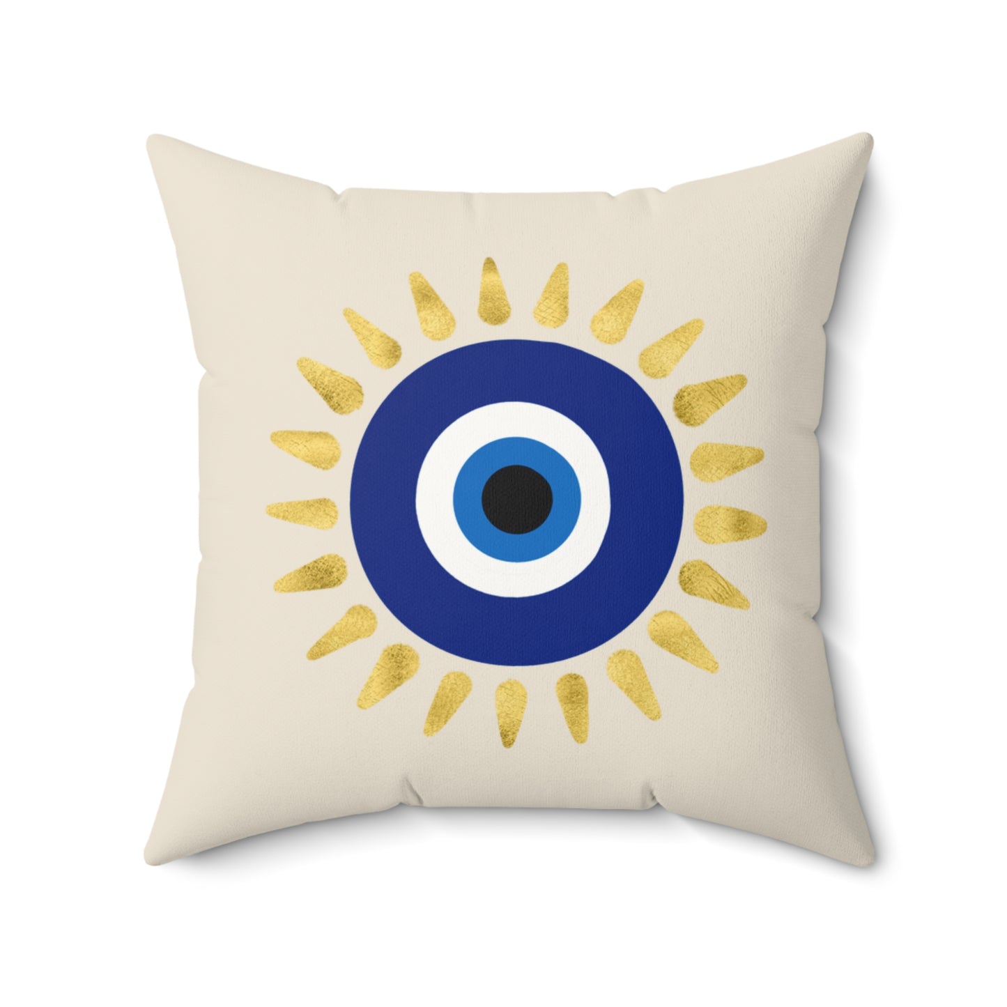 Decorative pillow with a blue and white devil eye design and gold accents on a beige background