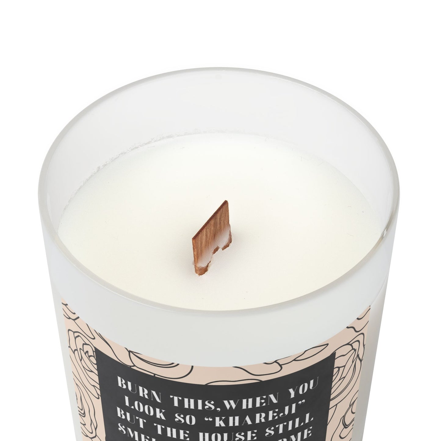 White candle with a wooden wick on a white background