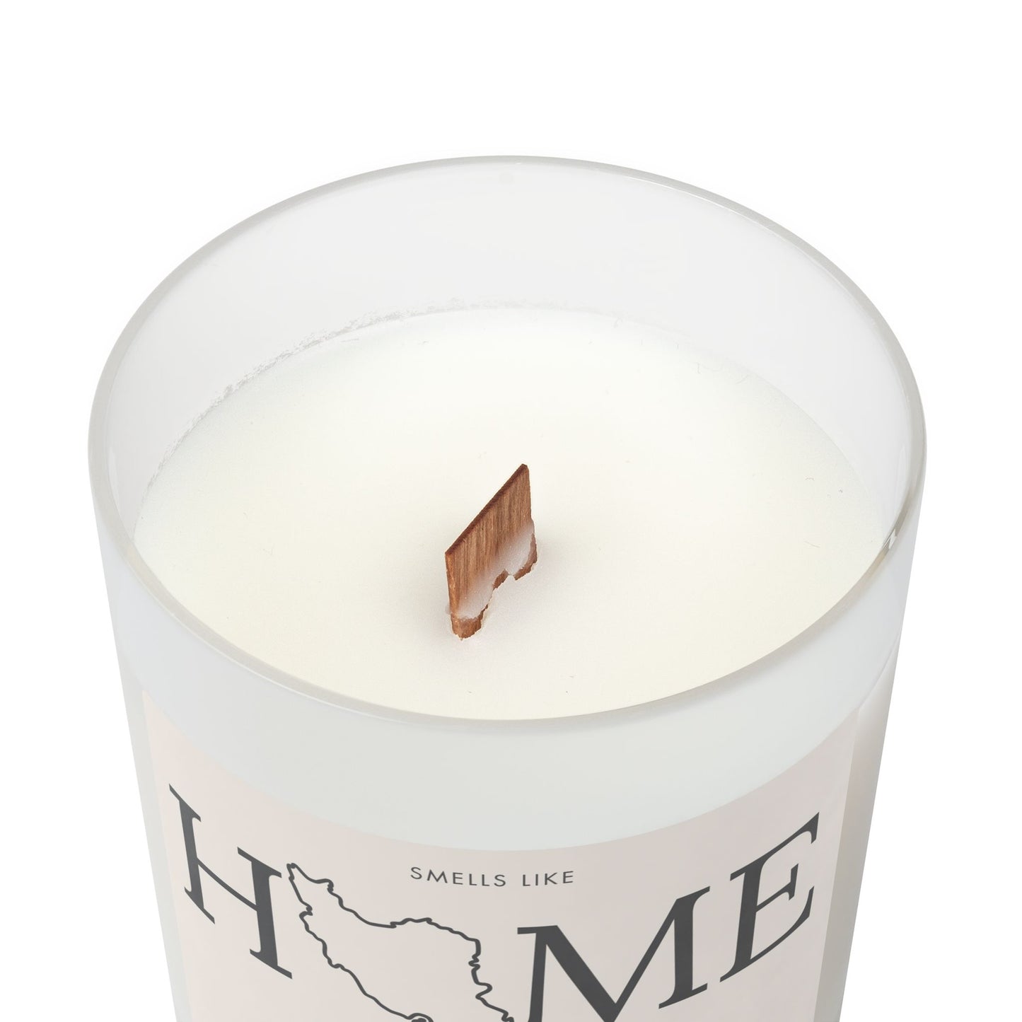 Candle in a container with 'HOME' text on a white background