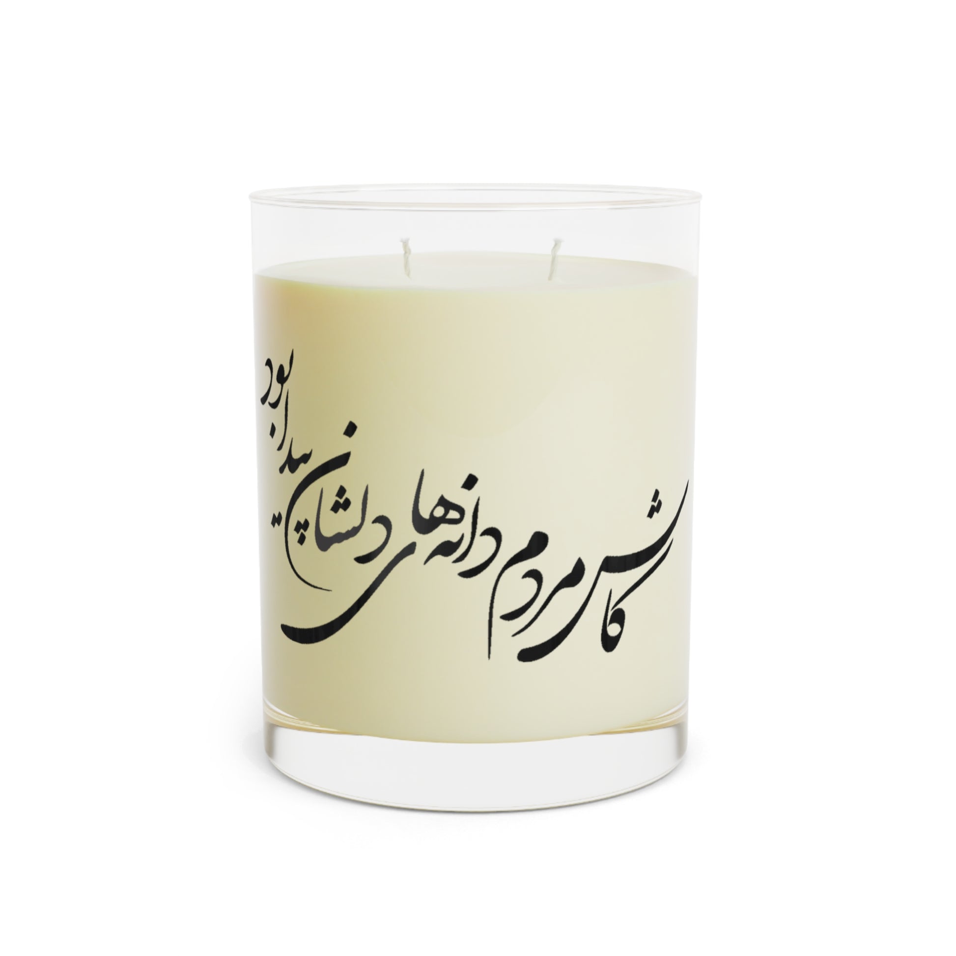 Candle with a beige label featuring farsi calligraphy text on a white background