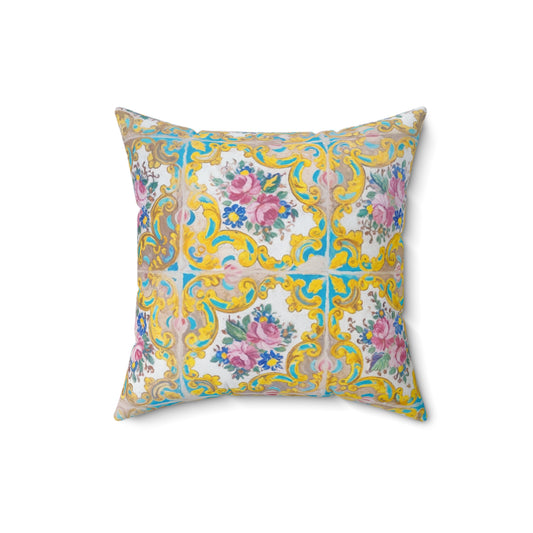 Decorative pillow with floral and tile pattern on a white background