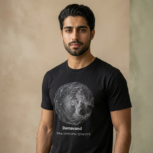 Man wearing a black t-shirt with a graphic design and text against a beige background