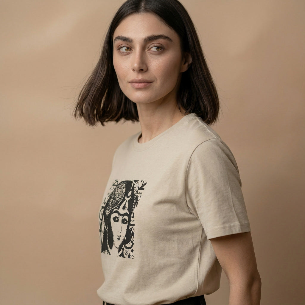 Woman wearing a beige t-shirt with a graphic design of Qajar woman on a beige background