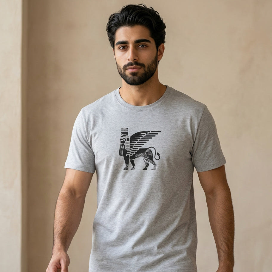 A man wearing a tshirt with Persian winged lion symbol on the chest. 