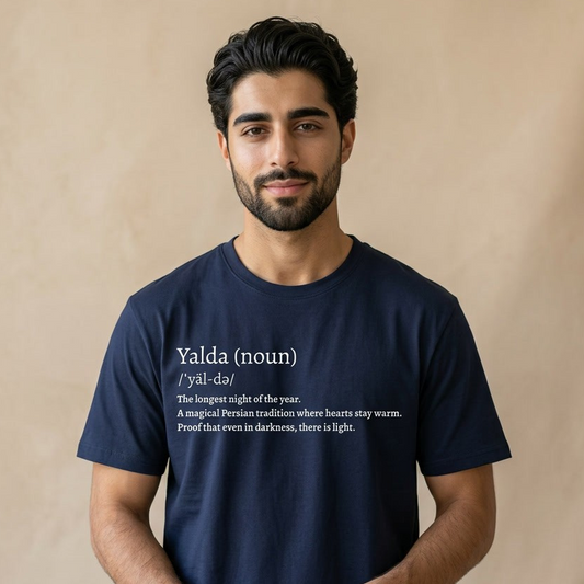 Man wearing a navy t-shirt with Yalda (noun) definition on its chest. 